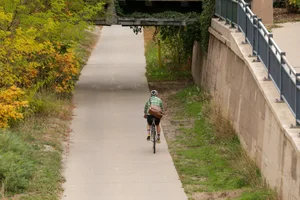 Cyclist riding on a multi-use trail in Colorado