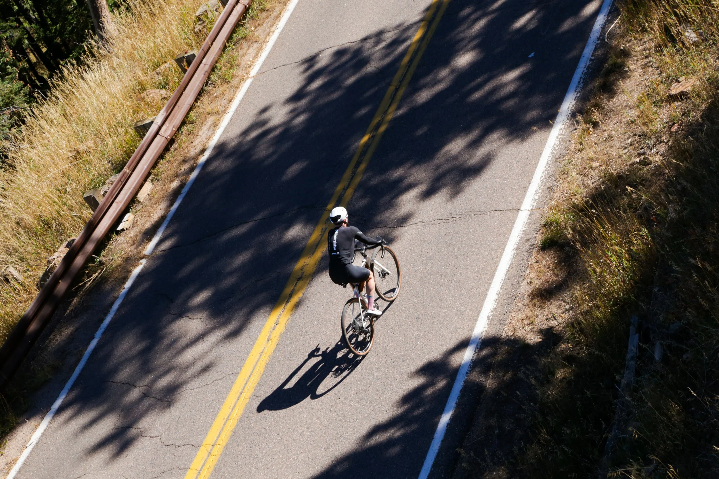 Aerial view of a winding mountain road in Colorado